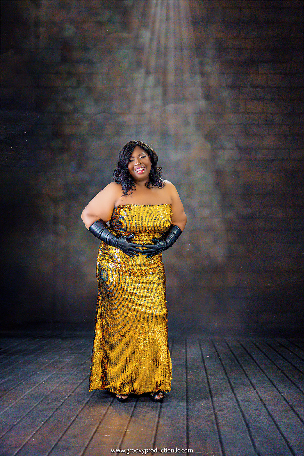 Tammy Davis in gold sparkly plus size dress for the 2024 Confidence Calendar